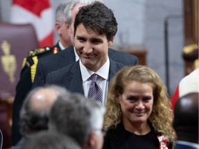 Prime Minister Justin Trudeau follows Governor General Julie Payette as she leaves the Senate Chamber following the Throne Speech Dec. 5. Francophone issues didn't get much attention as the government laid out its priorities.