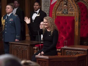 Governor General Julie Payette waves towards the gallery as she participates in a Royal Assent ceremony in the Senate Chamber on Parliament Hill in Ottawa on Thursday, Dec. 13, 2018. The speech from the throne marks the beginning of every new Parliament, which comes after a general election, as is the case this year, or following a prorogation. It is read in the Senate by the Governor General, who this time around is Julie Payette, a former astronaut who is reading the speech for the first time since she was named to the vice-regal post in 2017.THE CANADIAN PRESS/Justin Tang