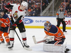 Edmonton Oilers goaltender Mikko Koskinen (19) makes a save on Ottawa Senators forward Brady Tkachuk (7) during the second period at Rogers Place.