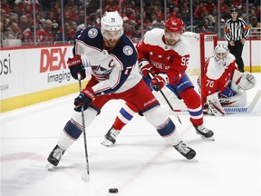 The Columbus Blue Jackets' Nick Foligno skates with the puck against the Washington Capitals.