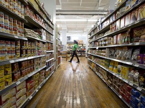 Grocery store shelves laden with processed foods.