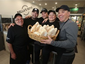 Bella's Boys Italian Kitchen in Ottawa Monday Dec 2, 2019. Eugenio, Andrew, Rob, Bella, and Nick Milito pose for a photo at Bella's.