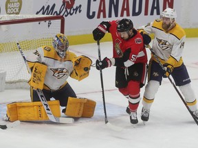 Juuse Saros from the Nashville Predators makes a save against Artem Amnisimov from the Ottawa Senators during first-period action at the Canadian Tire Centre on Thursday, Dec 19, 2019.