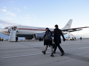 Prime Minister Justin Trudeau and son Xavier depart Ottawa on Monday, Dec. 2, 2019. Trudeau flies to London today to celebrate the 70th birthday of the NATO military alliance, which is facing questions and uncertainty about how to deal with Russia, China — and its own internal divisions.