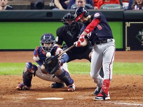 Anthony Rendon of the Washington Nationals hits a home run against the Houston Astros during Game 7 of the 2019 World Series at Minute Maid Park.