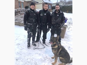 K9 officer Gunner, with handler Const. Pierre-François Blais and two other Gatineau police officers.