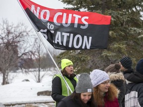 Erica Potter, an English and Drama teacher, is also a picket captain marching along Longfields Drive in Barrhaven as teachers in Ottawa stage a one day strike. Photo by Wayne Cuddington / Postmedia