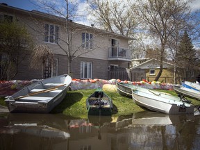 Boats parked on the lawn of homes along Rue de Versailles in the east Gatineau area during the flooding in spring of 2019.