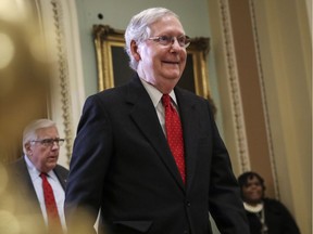 At nearly 2 o'clock in the morning, Senate Majority Leader Mitch McConnell (R-KY) exits the Senate floor after the Senate adjourned for the night during the impeachment trial proceedings at the U.S. Capitol on January 22, 2020 in Washington, DC. The Senate impeachment trial of U.S. President Donald Trump will resume on Wednesday at 1:00PM.