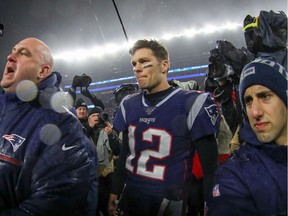 Tom Brady of the New England Patriots walks off the field after their 20-13 loss to the Tennessee Titans Saturday, Jan. 4, 2020.