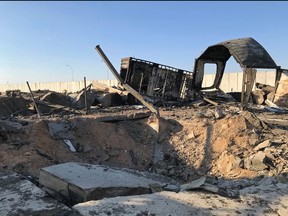 Debris and rubble are seen at the site where an Iranian missile hit at Ain al-Asad air base in Anbar province, Iraq Jan. 13, 2020. REUTERS/John Davison