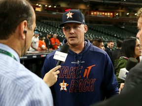 Houston Astros manager AJ Hinch (14) is interviewed before game six of the 2019 World Series against the Washington Nationals at Minute Maid Park.