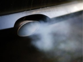 (FILES) Exhaust gases pouring out of from a diesel car.