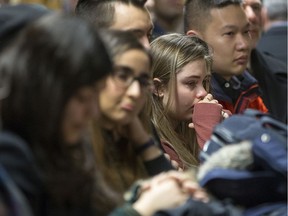 Students and faculty gather at the University of Ottawa to memorialize four Ottawa students who died in the Tehran plane crash.