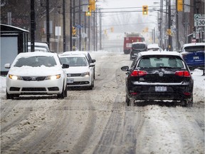 Traffic on Elgin Street as Ottawa was hit with freezing rain and snow Sunday January 12, 2020.