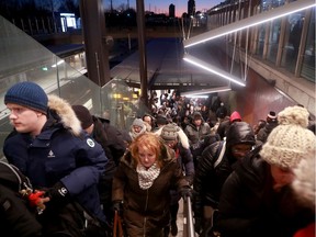 The one open platform at Tunney's Pasture LRT station was congested but still moving Monday (Jan. 20, 2020) evening. Only ten of the 13 trains were in operation during rush hour, leaving the exit stairwells somewhat clogged as people made their way up top to catch their connection buses.