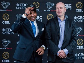 Osvaldo Jeanty has been hired as the first coach of the Ottawa BlackJacks basketball team. Jeanty (L) and team general manager Dave Smart pose for photos following the announcement. January 24, 2020.