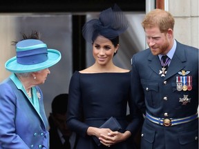 Prince Harry, Duke of Sussex and Meghan, Duchess Of Sussex, with Queen Elizabeth II.