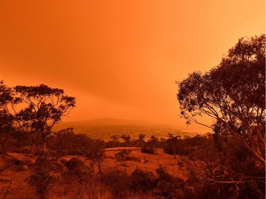 A red sky due to smoke from bushfires hang over the town of Jindabyne in New South Wales on January 4, 2020.