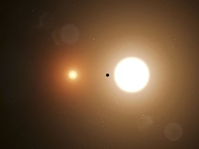 This NASA artist's illustration image obtained January 7, 2020 shows what researchers working with data from NASAs Transiting Exoplanet Survey Satellite (TESS) have discovered in the missions first circumbinary planet, a world orbiting two stars.