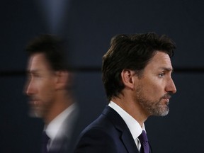 Canadian Prime Minister Justin Trudeau listens to a question during a news conference January 9, 2020.