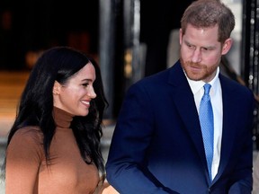 FILE PHOTO: Britain's Prince Harry and his wife Meghan, Duchess of Sussex, leave Canada House in London, Britain on January 7, 2020.