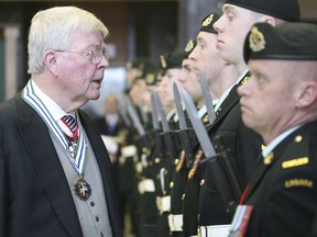 John Crosbie inspects the Guard of Honour after he is sworn in as Newfoundland and Labrador's Lieutenant Governor at the House of Assembly at Confederation Building in St. John's on Feb. 4, 2008.