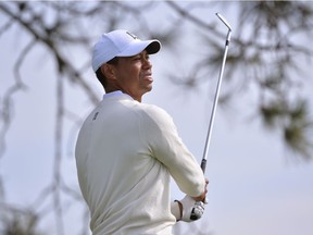 Jan 24, 2020; San Diego, California, USA; Tiger Woods watches his shot from the third tee during the second round of the Farmers Insurance Open golf tournament at Torrey Pines Municipal Golf Course - South Course.