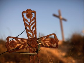 Crosses are seen on the top of a hill near the memorial for the 2010 earthquake in Titanyen, on the outskirts of Port-au-Prince, Haiti January 11, 2020.