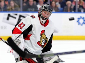 Senators goaltender Craig Anderson makes one of his 28 saves against the Sabres on Tuesday night.