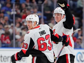 Tyler Ennis and Mike Reilly celebrate in the third period against Buffalon on Tuesday, Jan. 28, 2020.