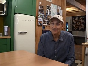 Network Musician James Taylor, shown in his kitchen, sent a video message to a dying fan, Darrell Johnson, who is currently in palliative care.