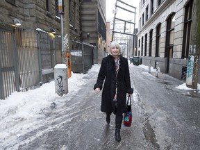 Federal Health Minister Patty Hajdu walks through a back alley after visiting the Molson Overdose Prevention Site in Vancouver's Downtown Eastside, Thursday, January 16, 2020.