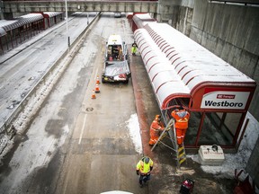 Crews were on site of the fatal bus crash along the transit way in Westboro, Sunday Jan. 13, 2019, working to clean up and get the station prepared for reopening.  Ashley Fraser/Postmedia