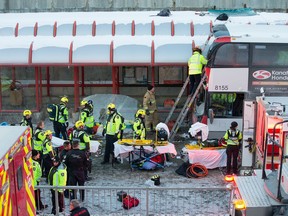 First responders attend to victims of a horrific rush hour bus crash at the Westboro Station near Tunney's Pasture.  Photo by Wayne Cuddington/ Postmedia    ADDITIONAL INFORMATION: Ottawa January 11, 2019