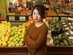 Victoria Chang in her Kowloon Market store on Friday.