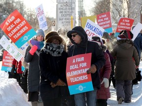 Teachers picketed at Churchill Alternative School in Ottawa on Monday.