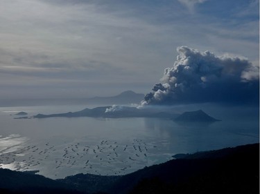 The errupting Taal Volcano is seen from Tagaytay City, Philippines, January 13, 2020.