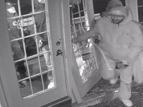 Security footage of two suspects in a break-in Sunday night.