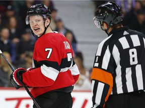 Brady Tkachuk has a discussion with referee Francois St Laurent during Tuesday's game against Chicago.