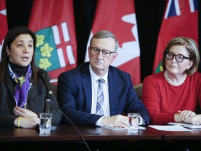 President and chief executive officer of Public Health Ontario, Dr. Eileen de Villa, left, Dr. David Williams, chief medical officer of Health, and Dr. Barbara Yaffe during a press conference to announce the first 'presumptive' case of the coronavirus in Canada on Saturday January 25, 2020.