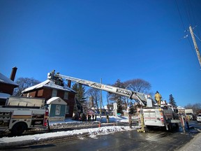 Firefighters at work on a blaze in a single-family home on Bronson Avenue at Lakeview on Saturday, Feb. 8, 2020.