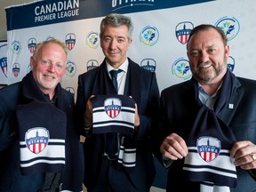 Atlético Ottawa Strategic Partner Jeff Hunt (L-R), Club Atlético de Madrid General Manager Miguel Ángel Gil, and Canadian Premier League Commissioner David Clanachan at the official announcement of the Ottawa club becoming the eighth team in the CPL.