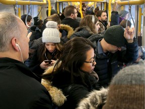 FILES: Passengers in a jammed LRT train from Tunney's Pasture.