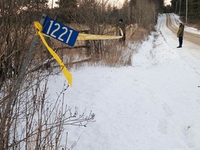 Police put up yellow caution tape at the scene of a Hydro One helicopter crash on Thursday, Dec. 14, 2017. The crash near Tweed killed the pilot ad three line workers.