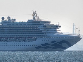 The Diamond Princess cruise ship with around 3,700 people on board sits anchored in quarantine off the port of Yokohama after a number of passengers were confirmed to be infected with coronavirus, on Feb. 5, 2020