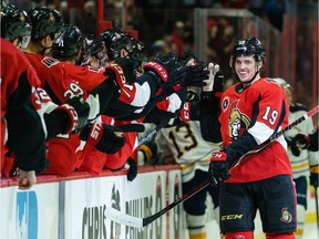 Drake Batherson #19 of the Ottawa Senators celebrates his first-period goal against the Buffalo Sabres with teammates on the bench at Canadian Tire Centre on Tuesday.