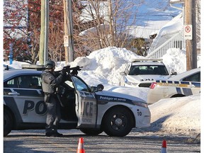 Police standoff in Gatineau, on Wednesday, Feb. 12, 2020.