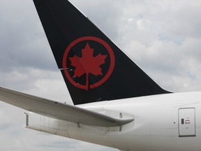 An Air Canada plane sits parked at Toronto Pearson International Airport (YYZ) in Toronto, Ontario, Canada, on Monday, July 22, 2019.
