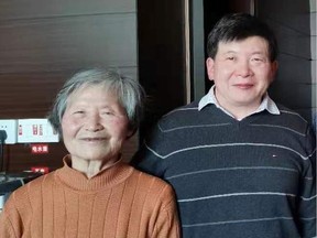 Kai Huang, right, and his mother Yi.
